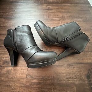 Black leather heel booties. Size 7. Worn, still in good condition.